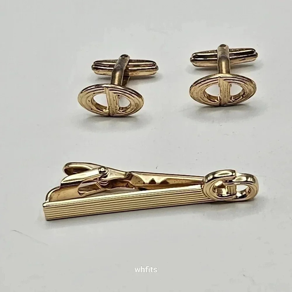 Christian Dior Gold Tone Cufflinks and Tie Bar Set